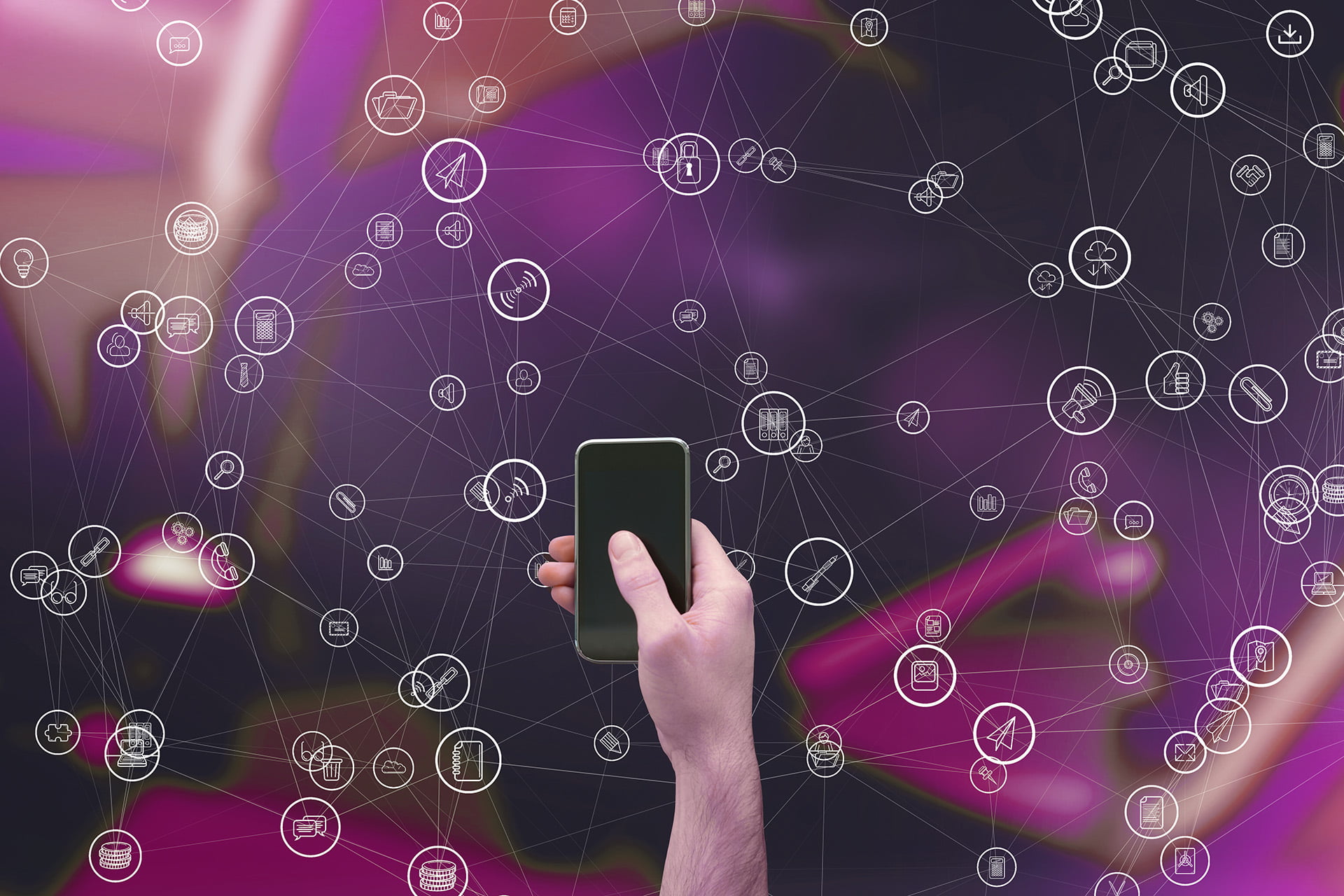 digital composite of hand holding smartphone with vignettes digital composite of hand holding smartphone with vignettes
